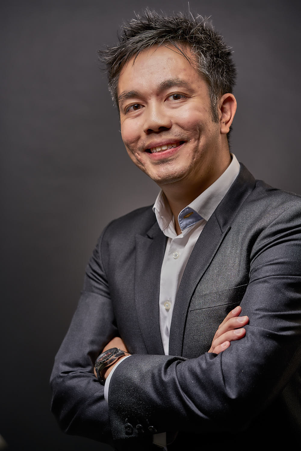  A sharp and polished corporate executive portrait highlighting professionalism and confidence in formal business attire.