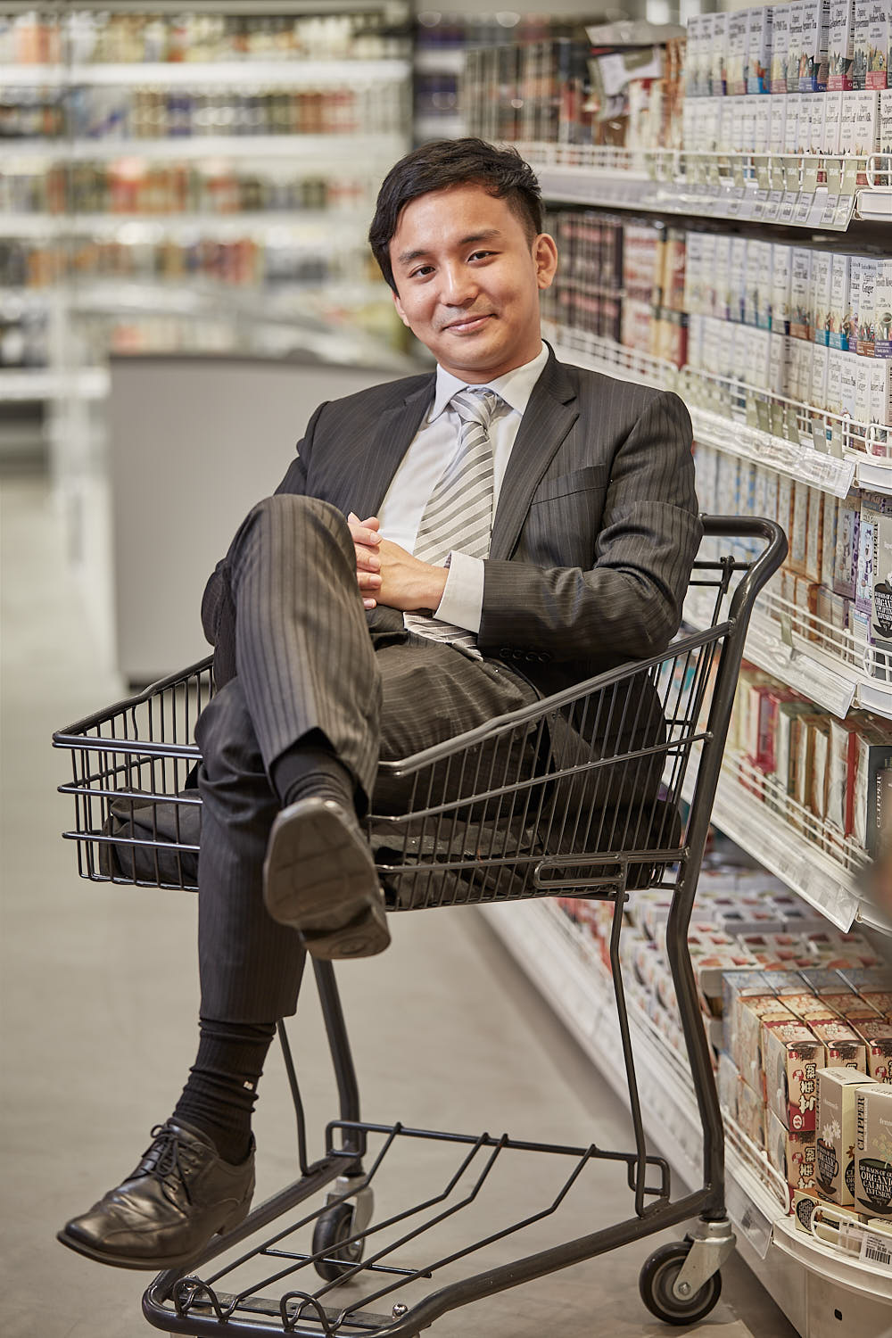 Portrait of business owner in supermarket.