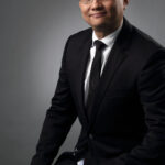 Portrait of CEO dressed in business attire.