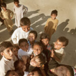 Children having fun and playing in a refugee camp in Charsadda, Pakistan, August 2010.