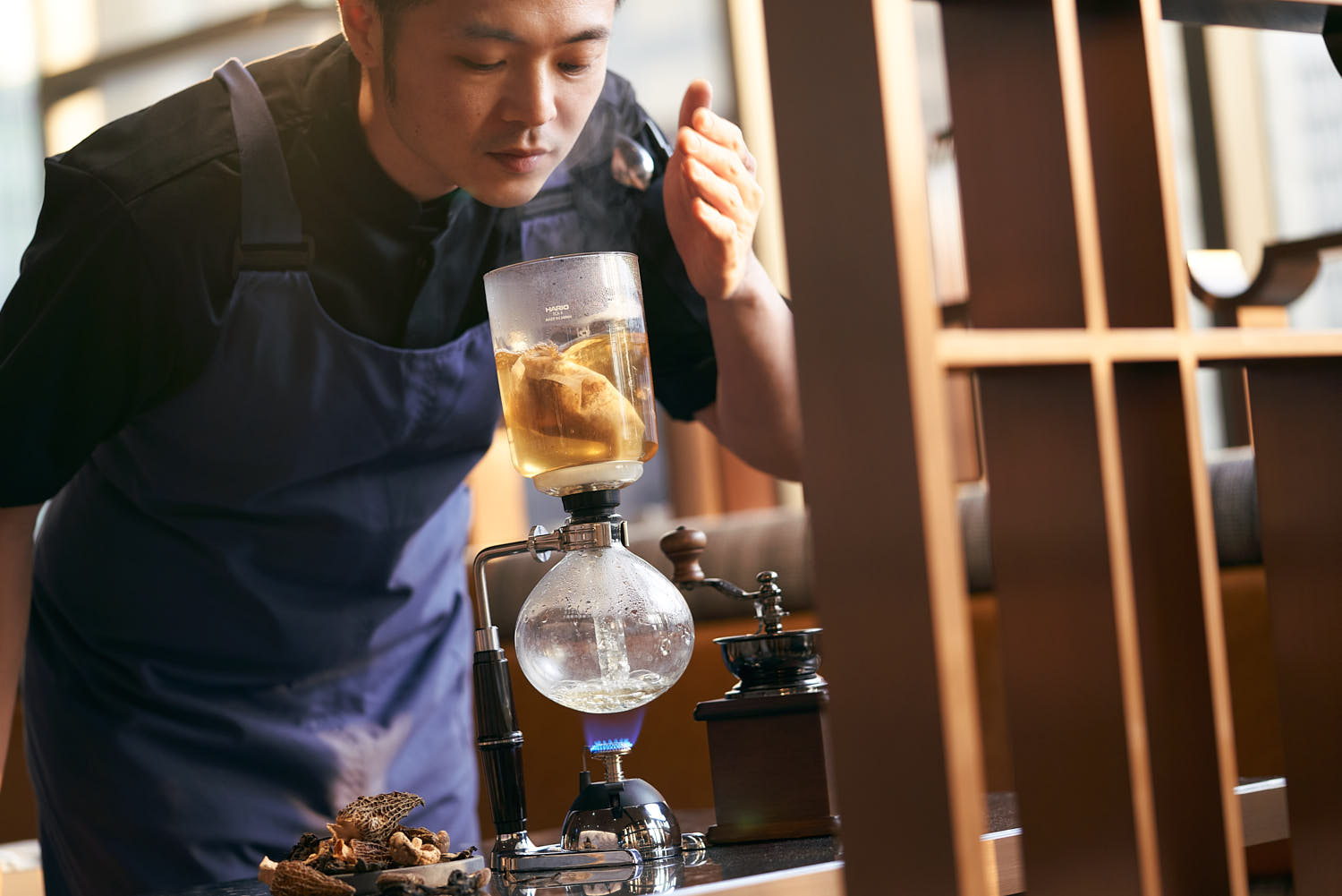 Professional chef crafting a sophisticated gourmet dish in a restaurant.