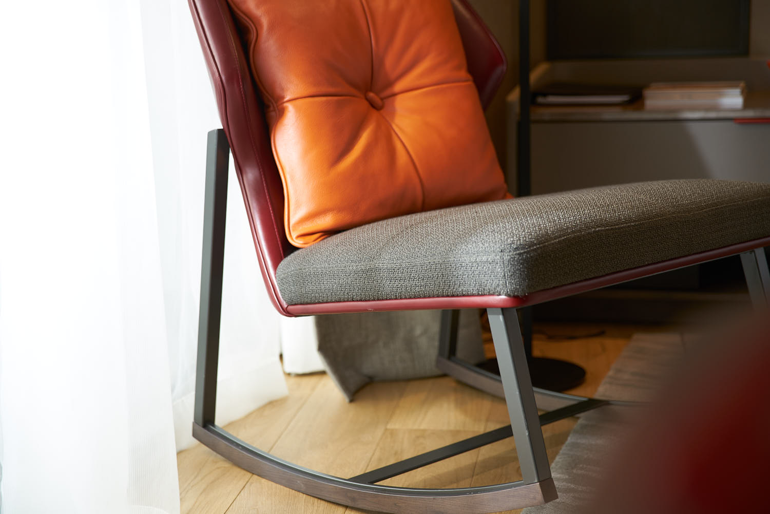 Close-up of a stylish chair in Swissôtel hotel interior.