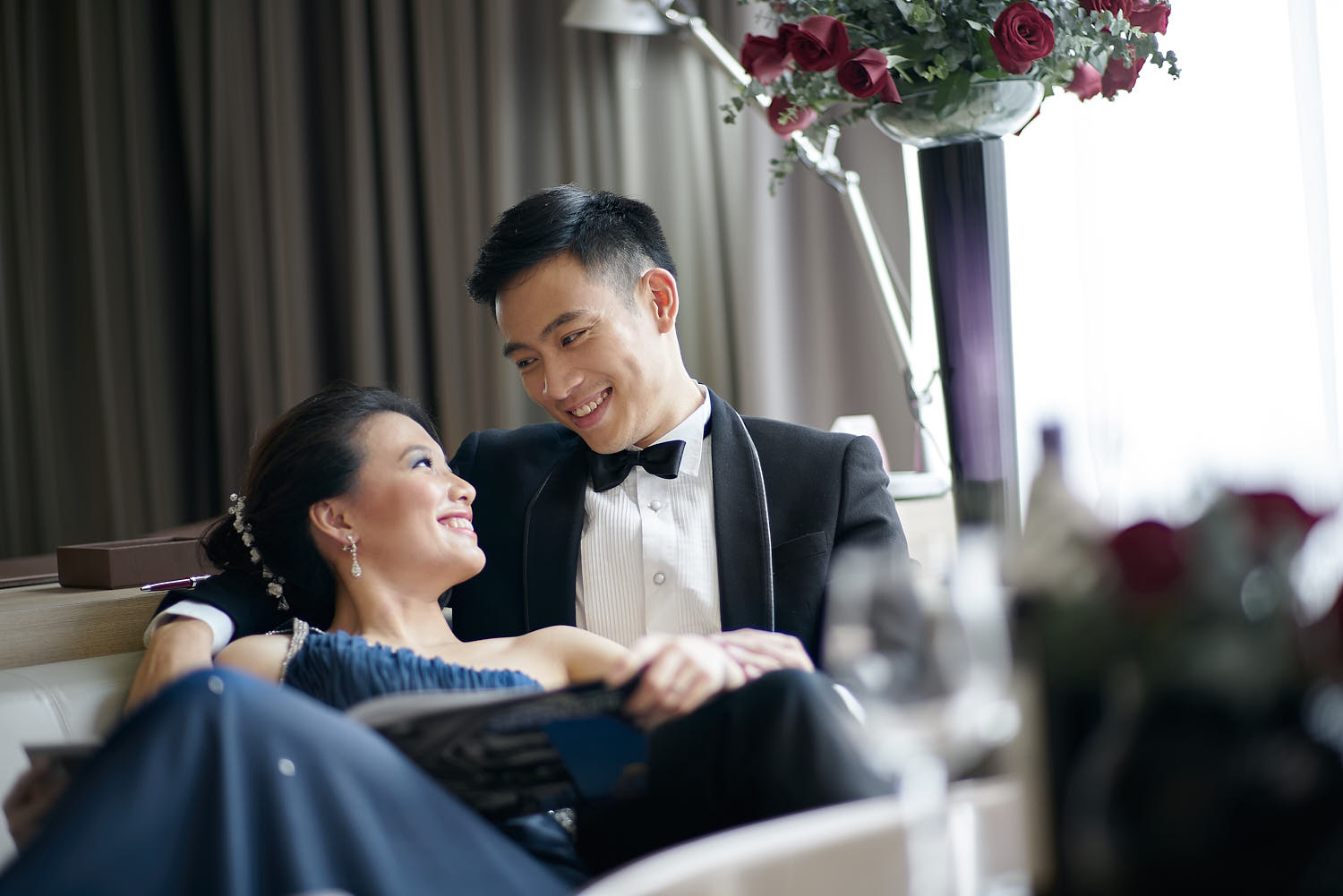 Newlyweds sharing a special, intimate time together in their wedding suite.