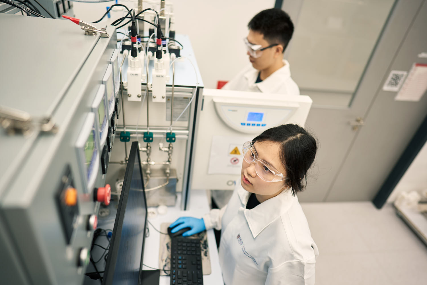 Biotech researcher conducting experiments in a cutting-edge laboratory.