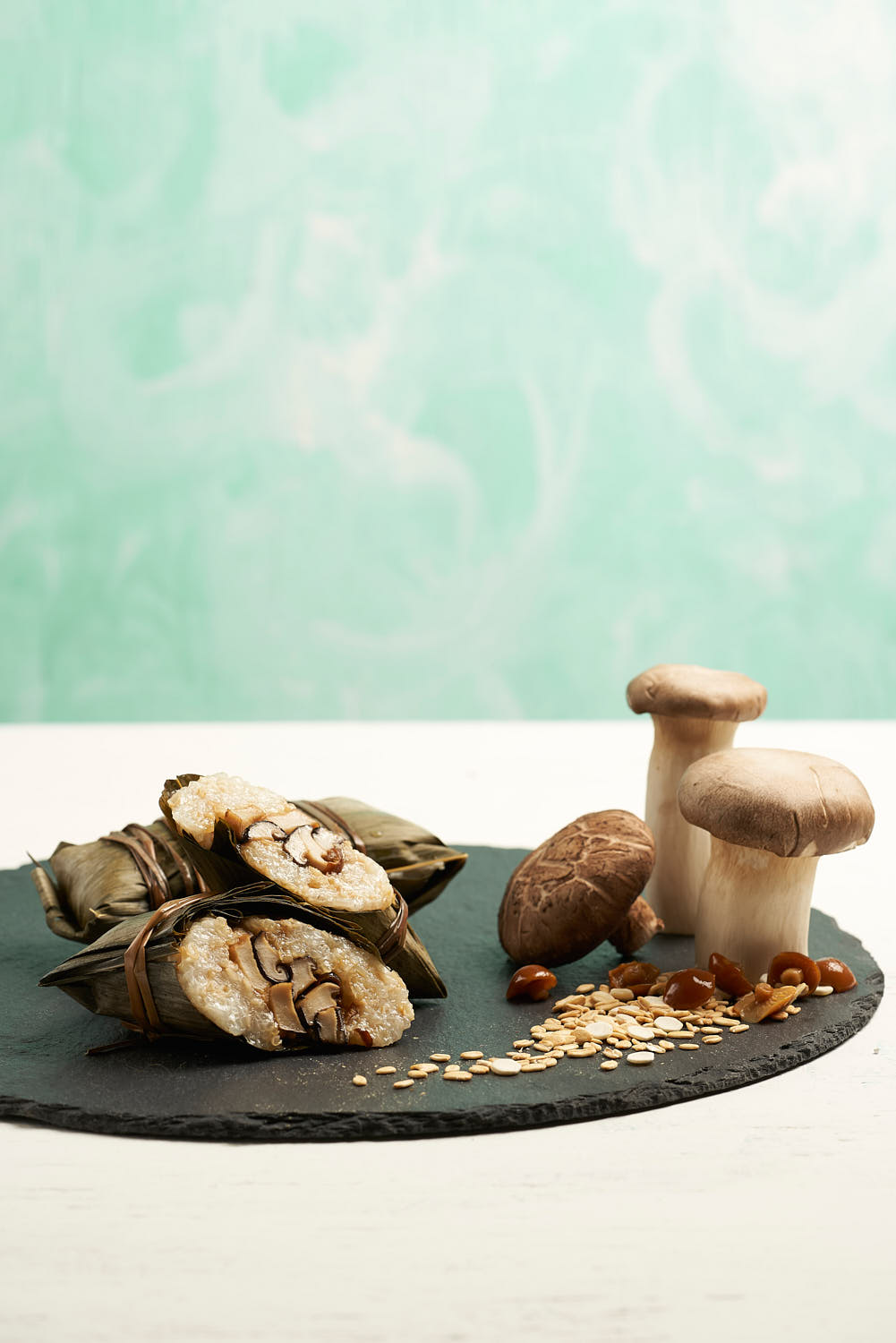 Tiny vegetarian dumplings filled with a colorful mix of mushroom, served on a rustic plate.