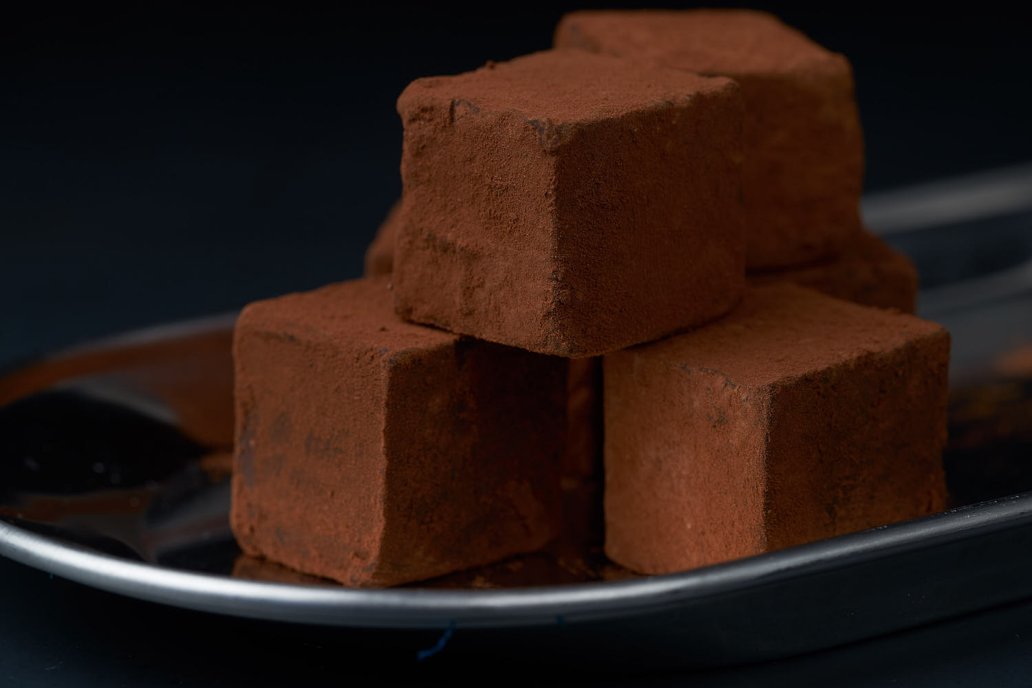 Awfully chocolate signature truffles macro shot.