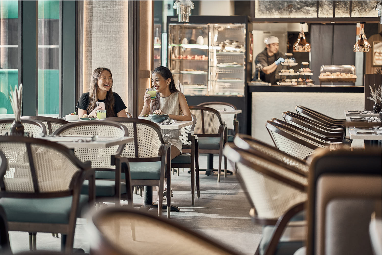 Friends sharing delicious tapas and drinks at a cozy bar restaurant.