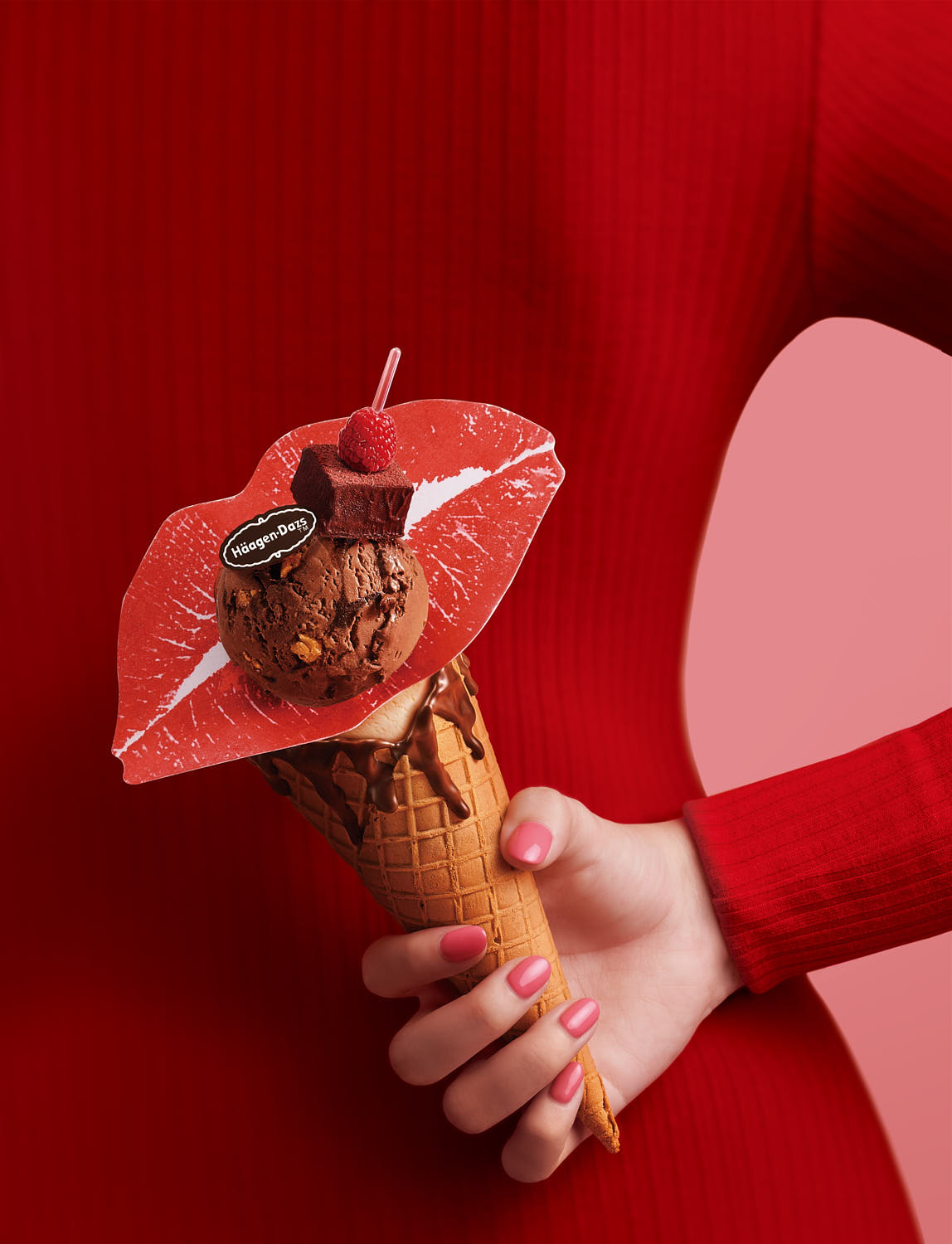 Close-up of a Häagen-Dazs ice cream scoop with rich, creamy texture in a waffle cone.