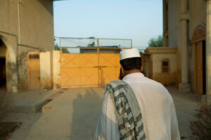 A man walking to his daily prayers in Malakand, Pakistan, August 2010.