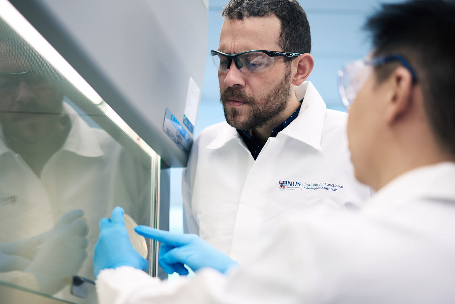 Medical scientists collaborating and discussing the results of their latest experiment.