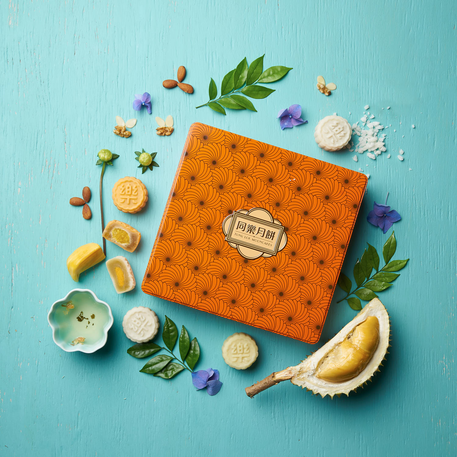 Top-down view of durian-flavored mooncake showcasing its detailed crust pattern.