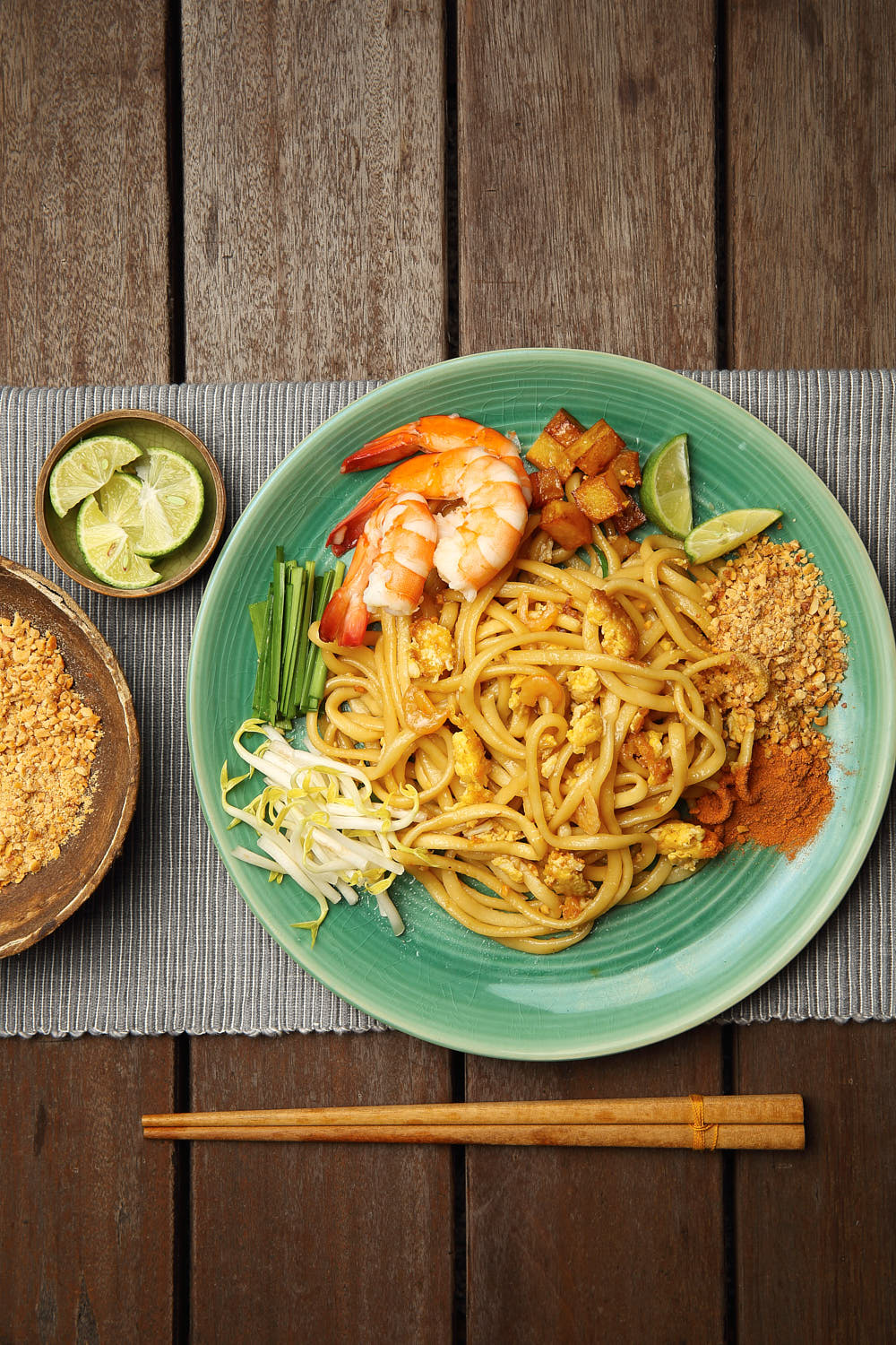 Homemade Pad Thai noodles prepared using a Philips noodle maker, served with prawns and peanuts.