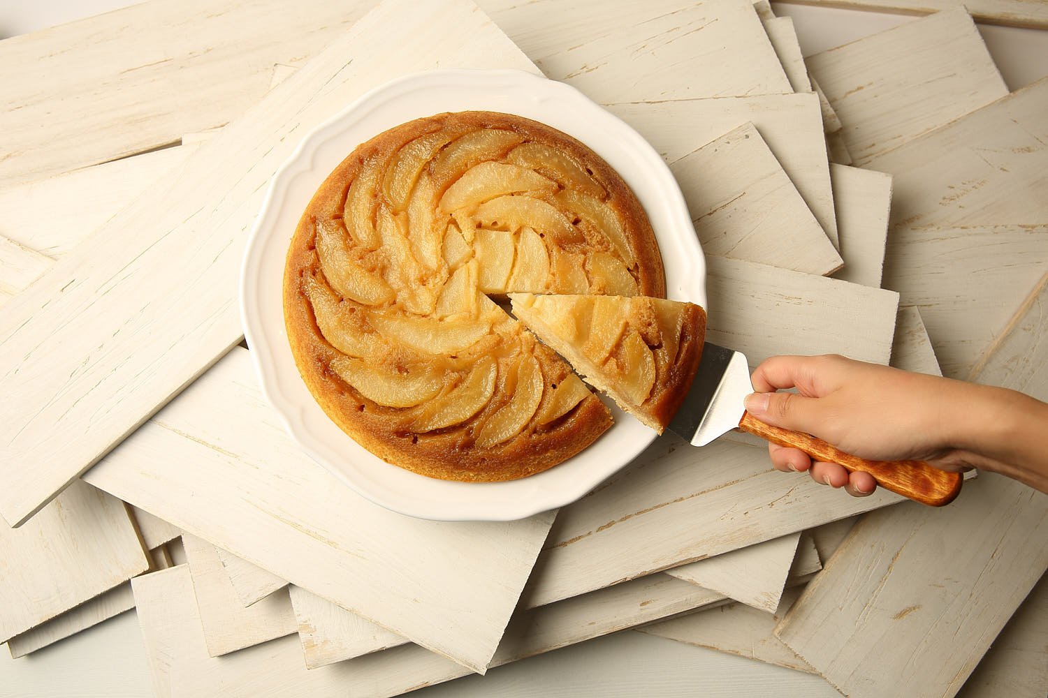 Golden-brown pear pie with flaky crust and juicy fruit filling.