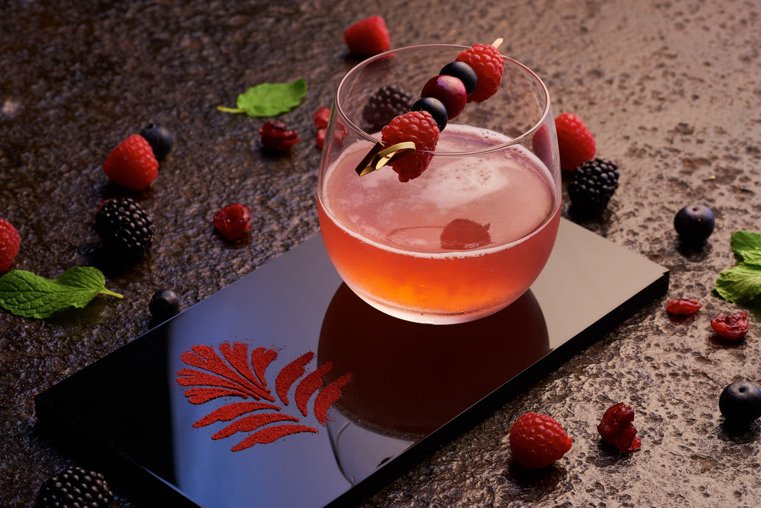 A refreshing berry-infused beverage captured in detail, served at Pan Pacific Hotel.