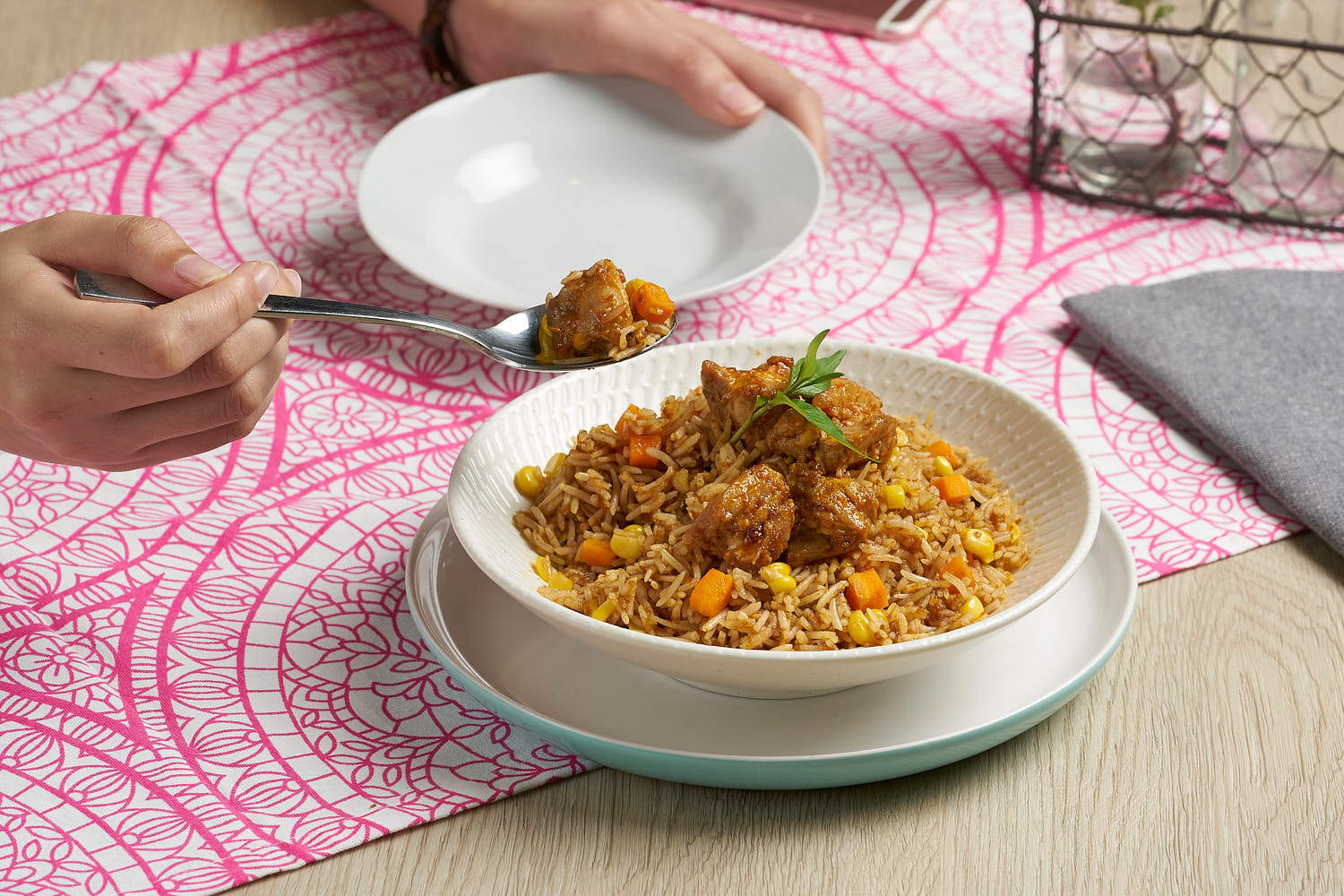 Cozy lifestyle scene showcasing Prima Curry Chicken enjoyed at the dining table.