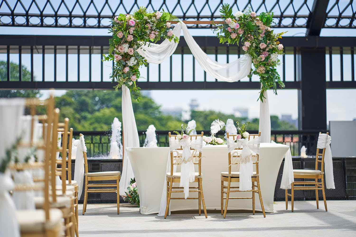 Rooftop wedding solemnization ceremony overlooking the city skyline.