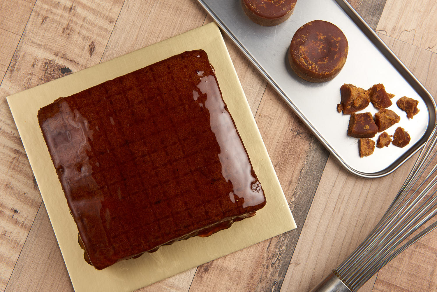 Top view of traditional Sinpopo cake glazed with sweet gula melaka sauce.