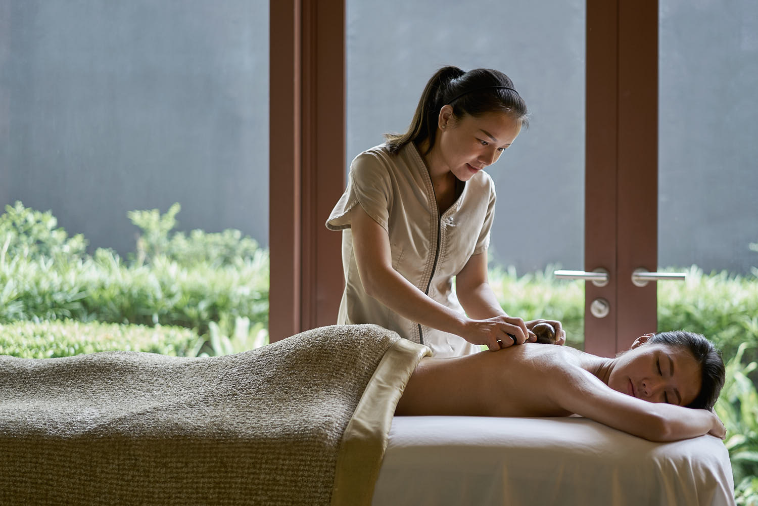 Relaxing spa massage session at a luxury hotel resort for ultimate rejuvenation.