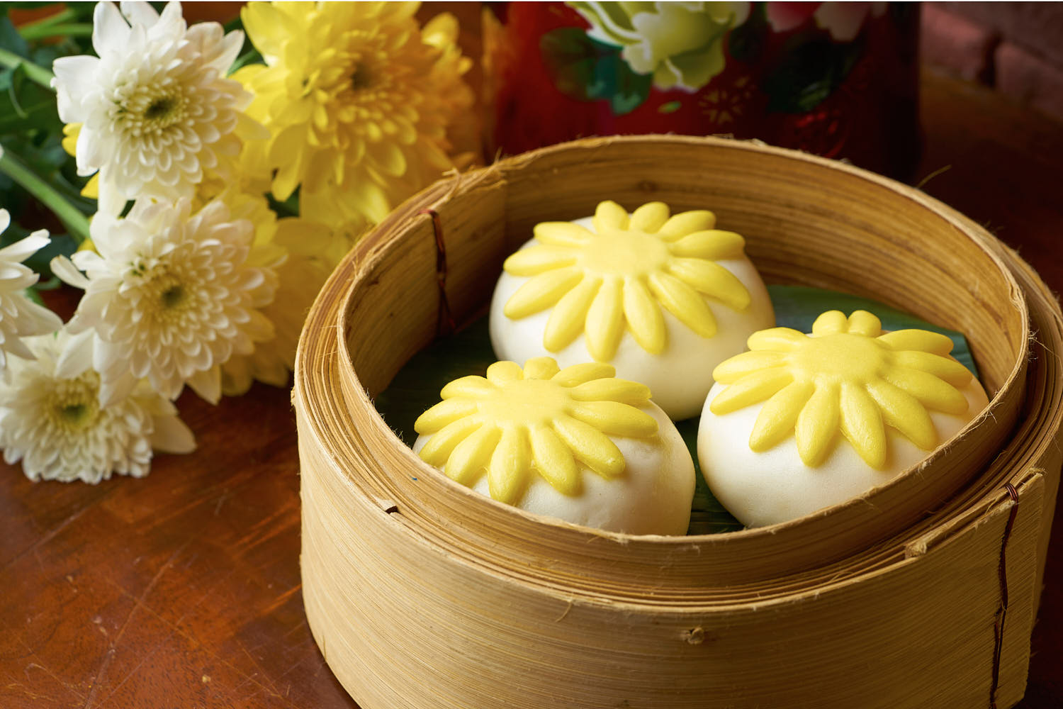 Close-up of freshly steamed bun showcasing its pillowy texture and slight sheen.