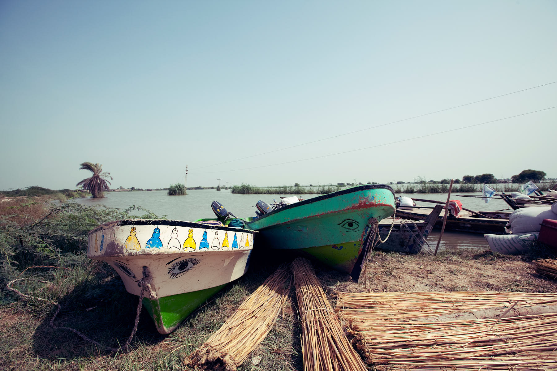 Rescue boats navigating floodwaters in Sujawal, Pakistan, August 2010.