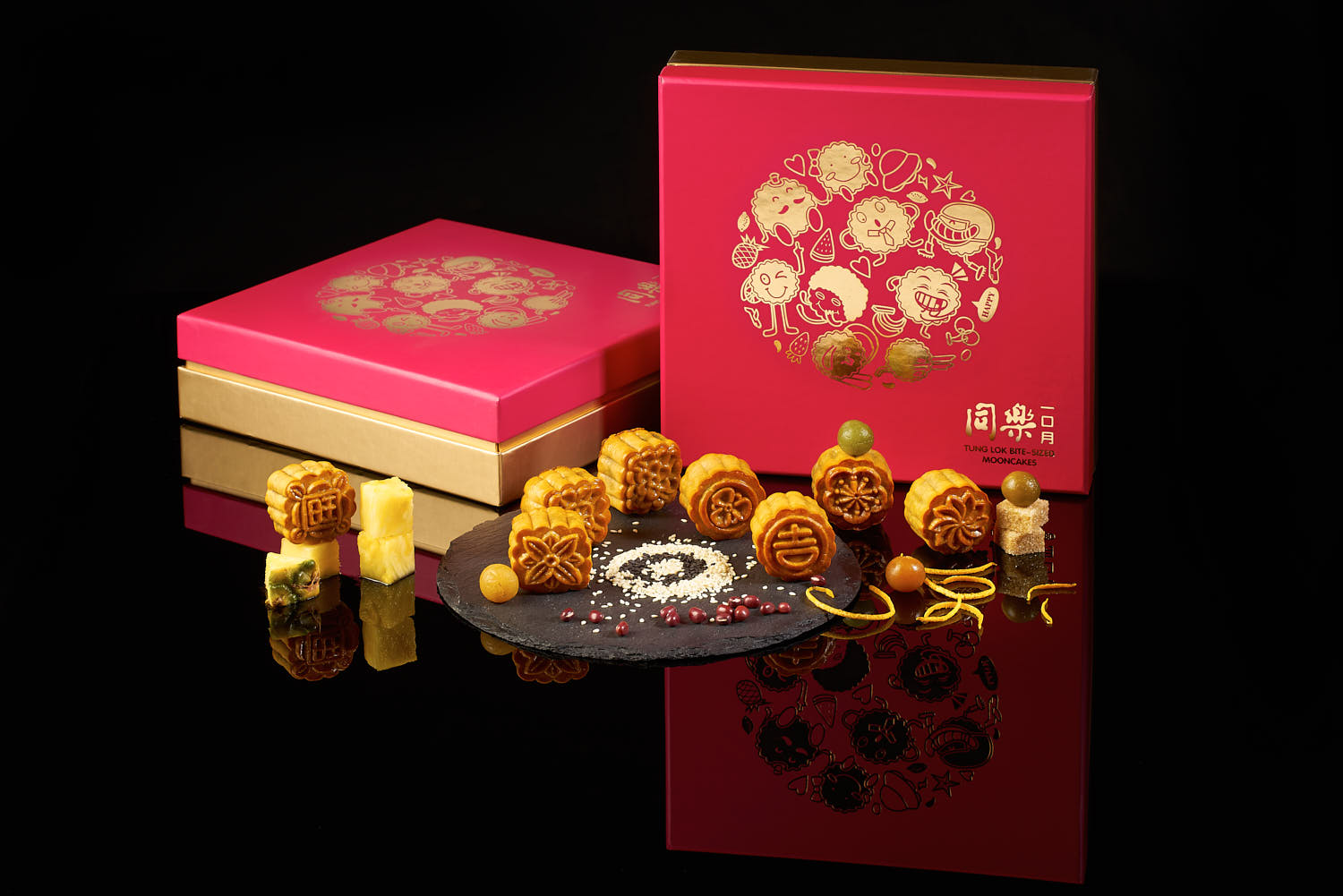 Tung Lok mooncake with intricate design placed on a sleek black gloss surface.