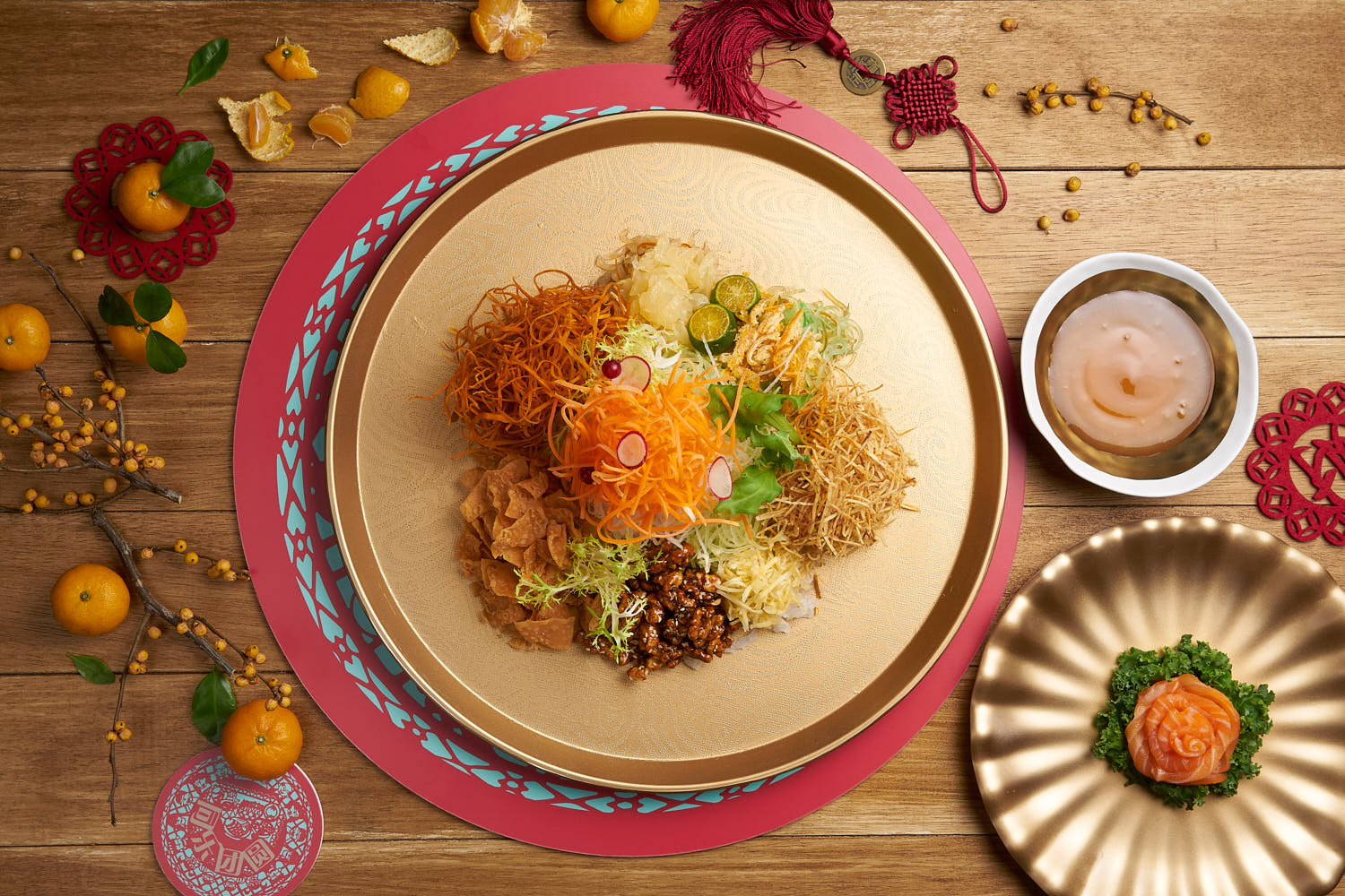 Vibrant TungLok Chinese New Year yusheng with fresh colorful ingredients and festive presentation.