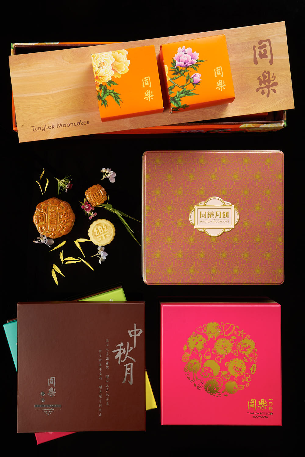 Flat lay of TungLok mooncake packaging, showcasing traditional motifs and premium presentation.